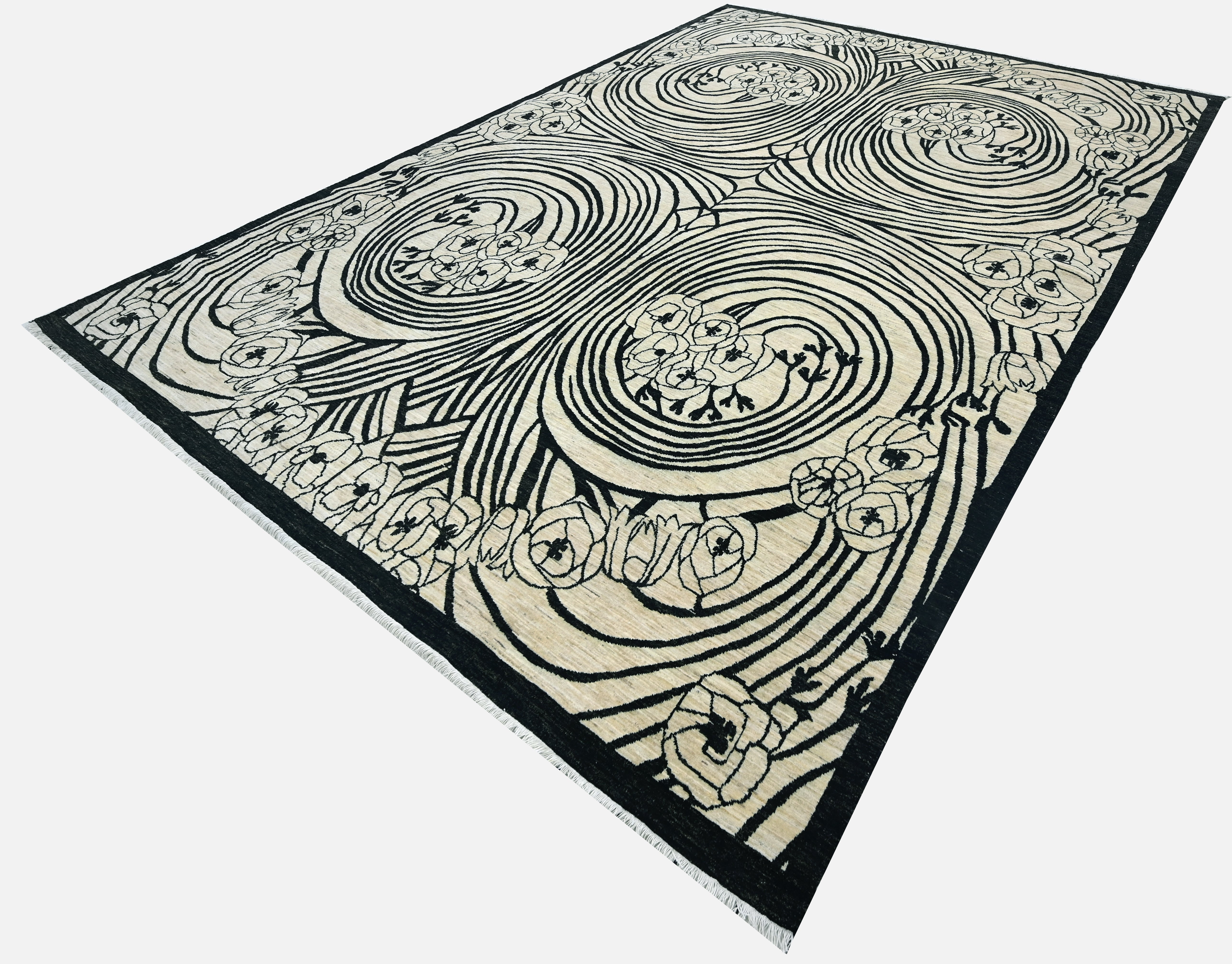 Decorative rug with black and white pattern on a plain background