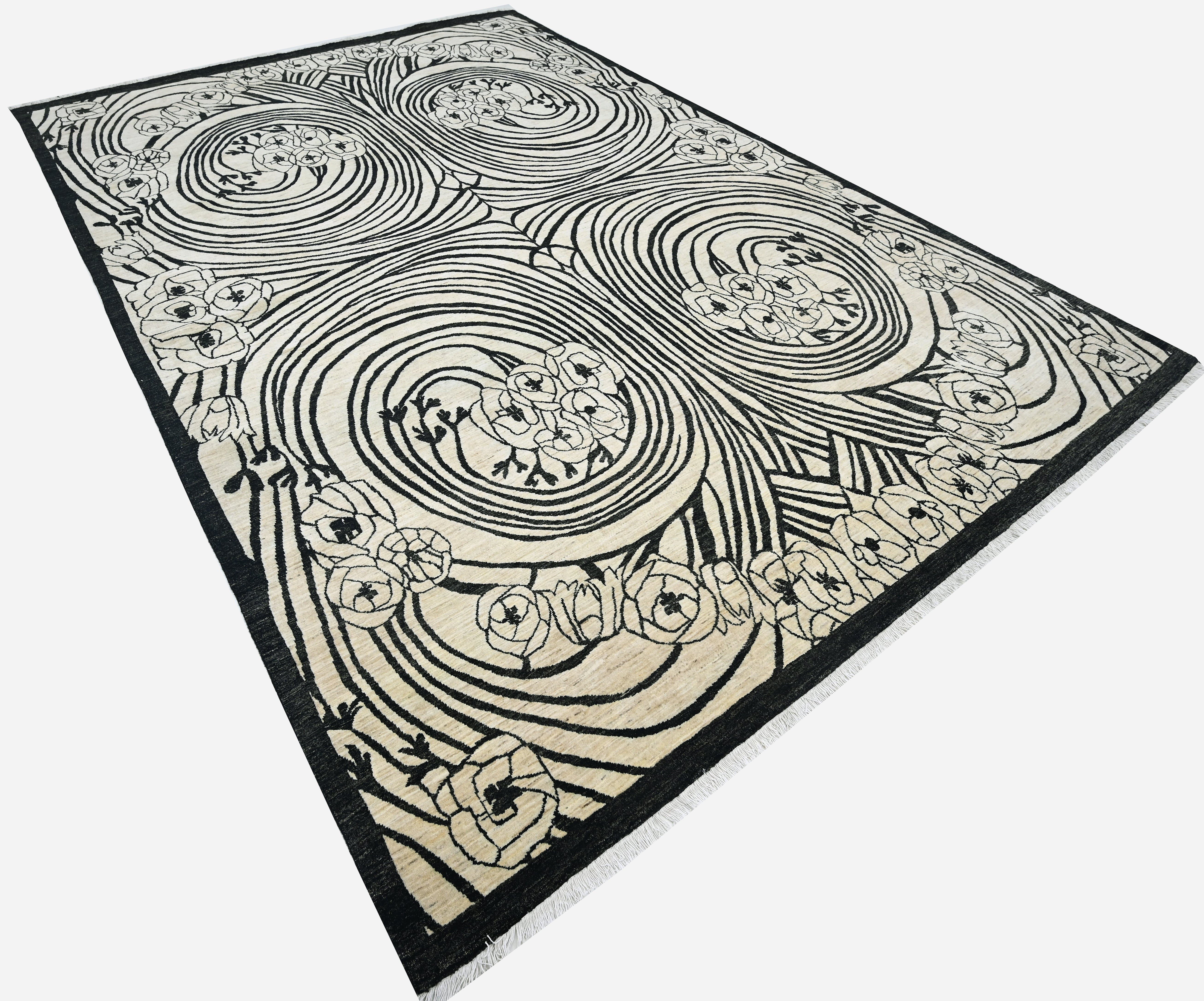 Decorative art-nouveau rug with black and white abstract pattern on a plain background