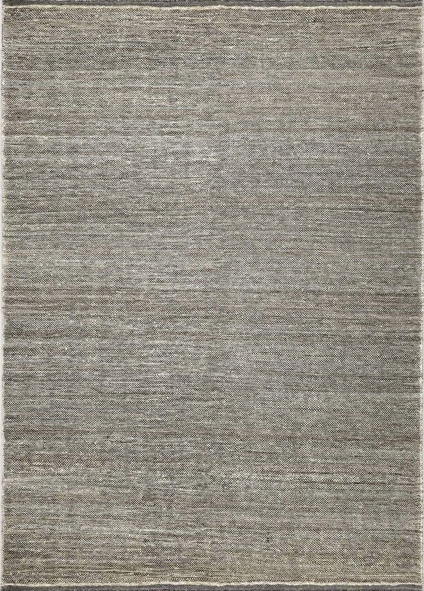 A flatweave kilim rug with a subtle checkered pattern in brown tones, with a textured surface. ethnicraft collection