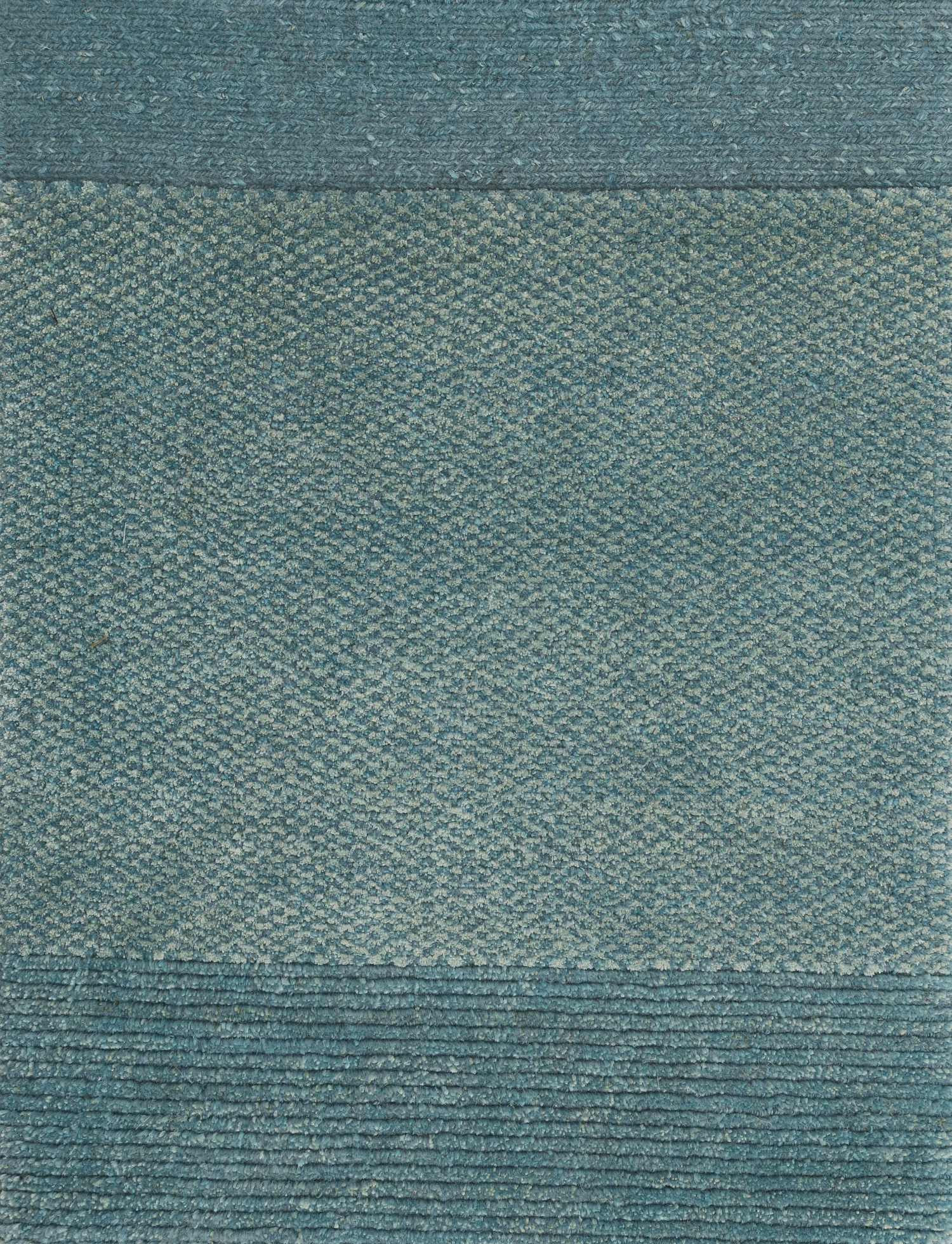 A small rectangular sample of a blue carpet with a textured design. chromatic architecturals damboord tapijt