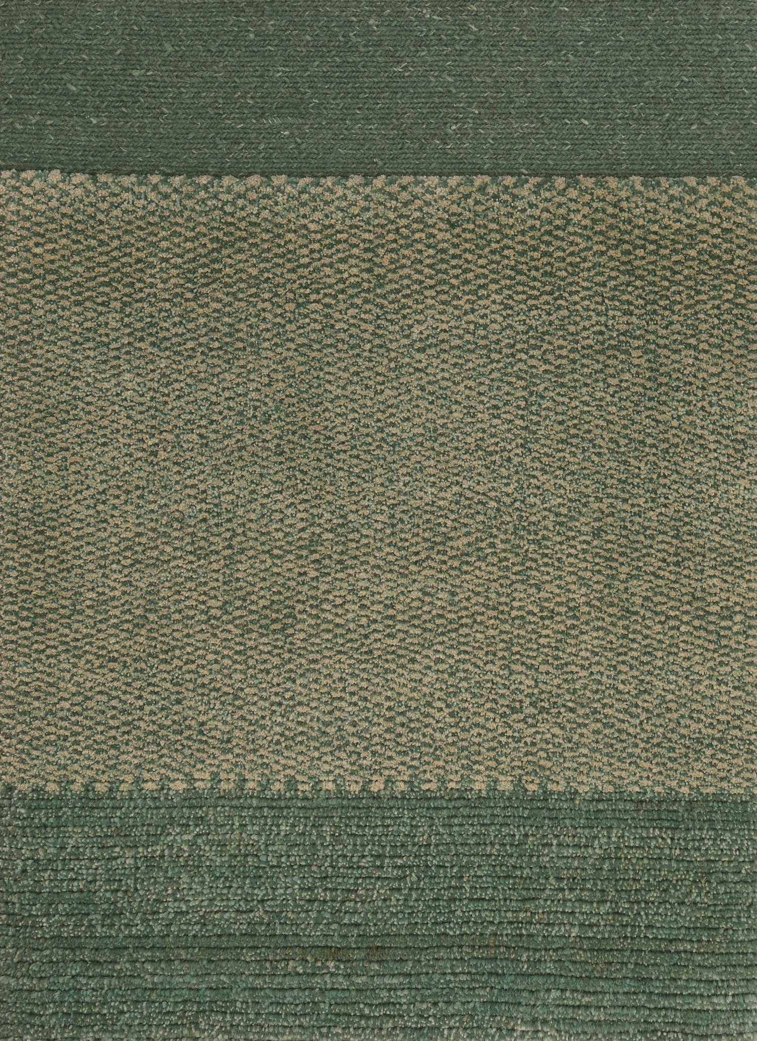 A rectangular sample of Chromatic Coral Green carpet featuring various shades of green with a textured pattern. architecturals