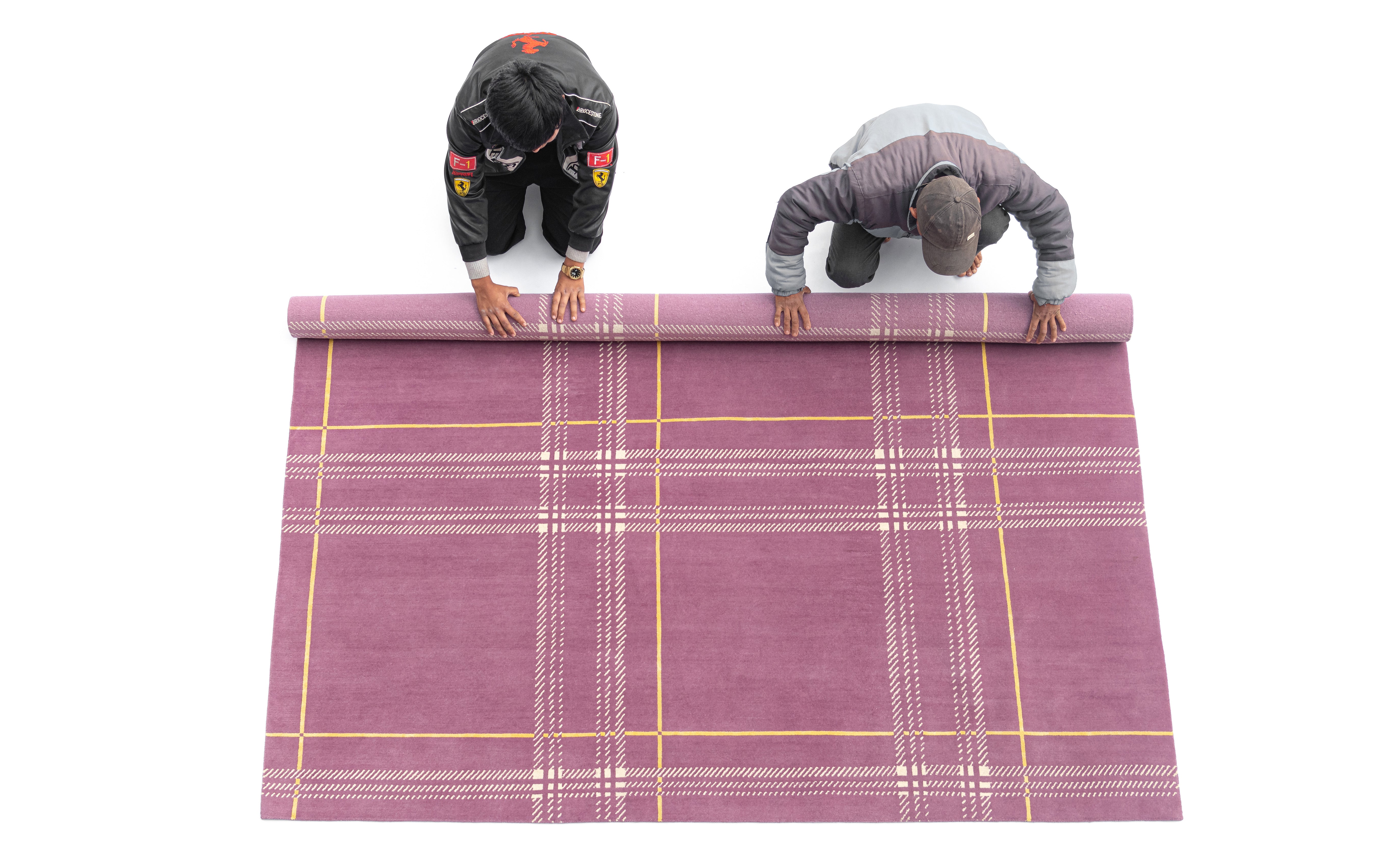 Léon Stynen écossais rug collection – handcrafted Tibetan wool and silk rugs with refined checkered design inspired by Antwerp archives.