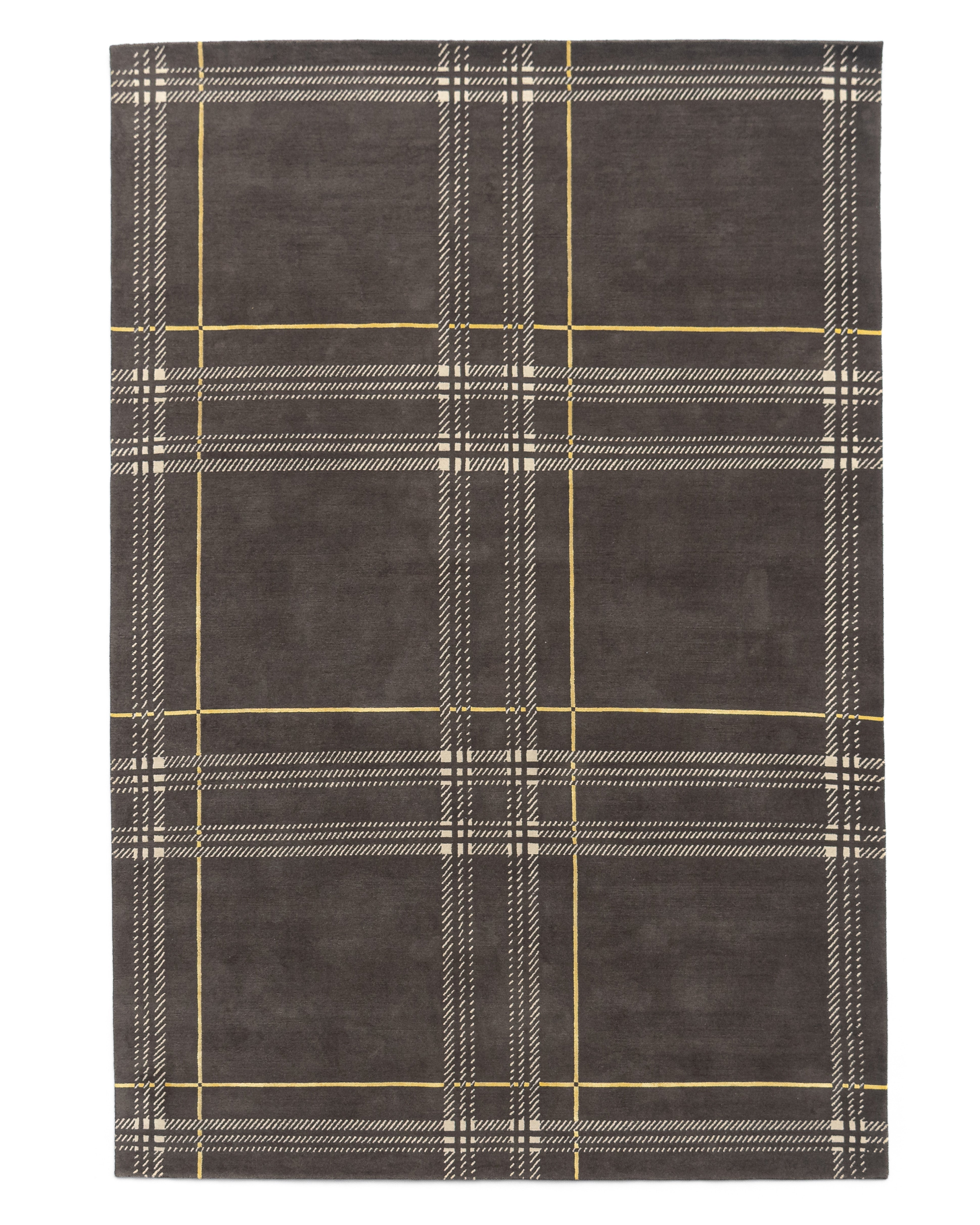 Léon Stynen écossais rug collection – handcrafted Tibetan wool and silk rugs with refined checkered design inspired by Antwerp archives.