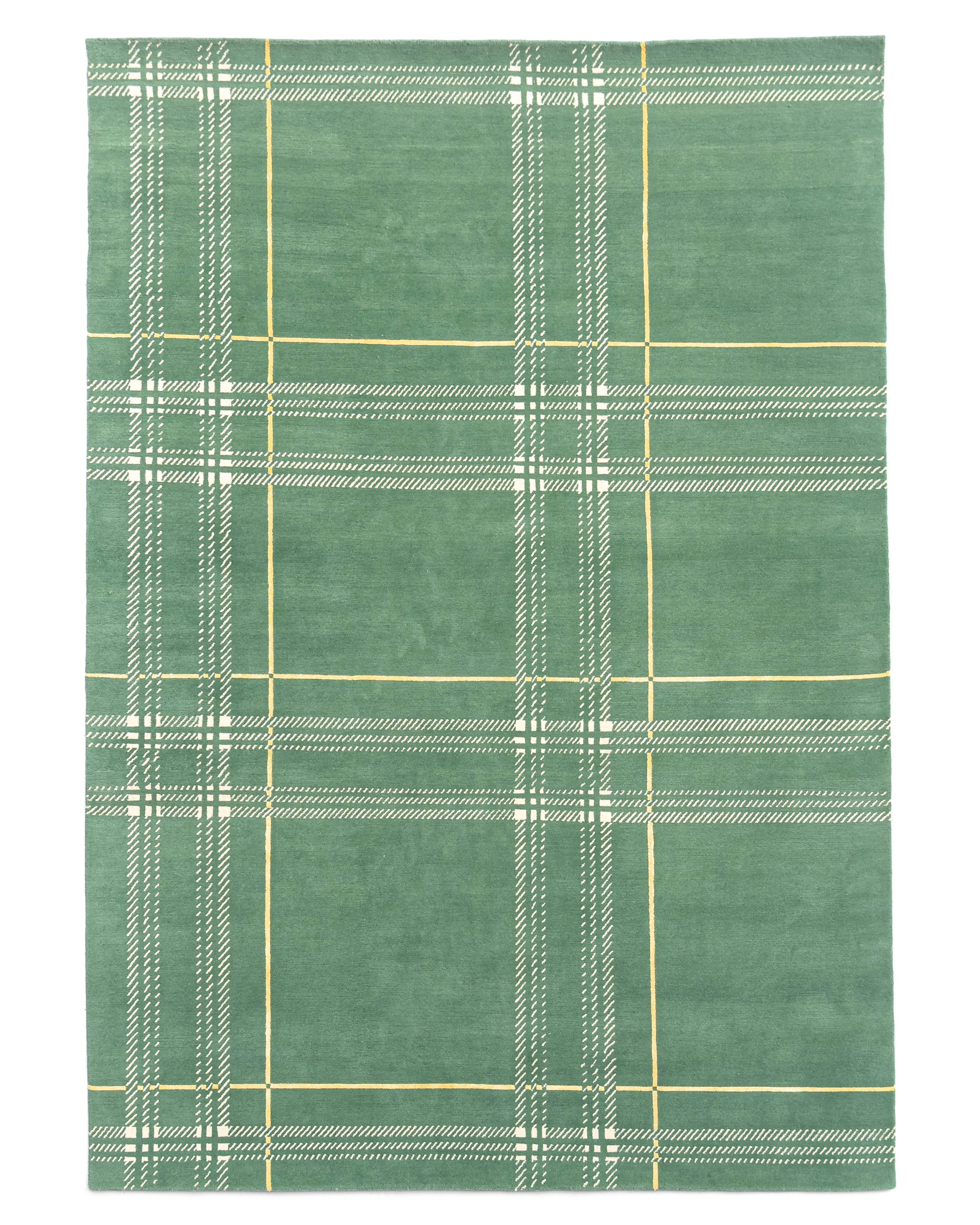Léon Stynen écossais rug collection – handcrafted Tibetan wool and silk rugs with refined checkered design inspired by Antwerp archives.