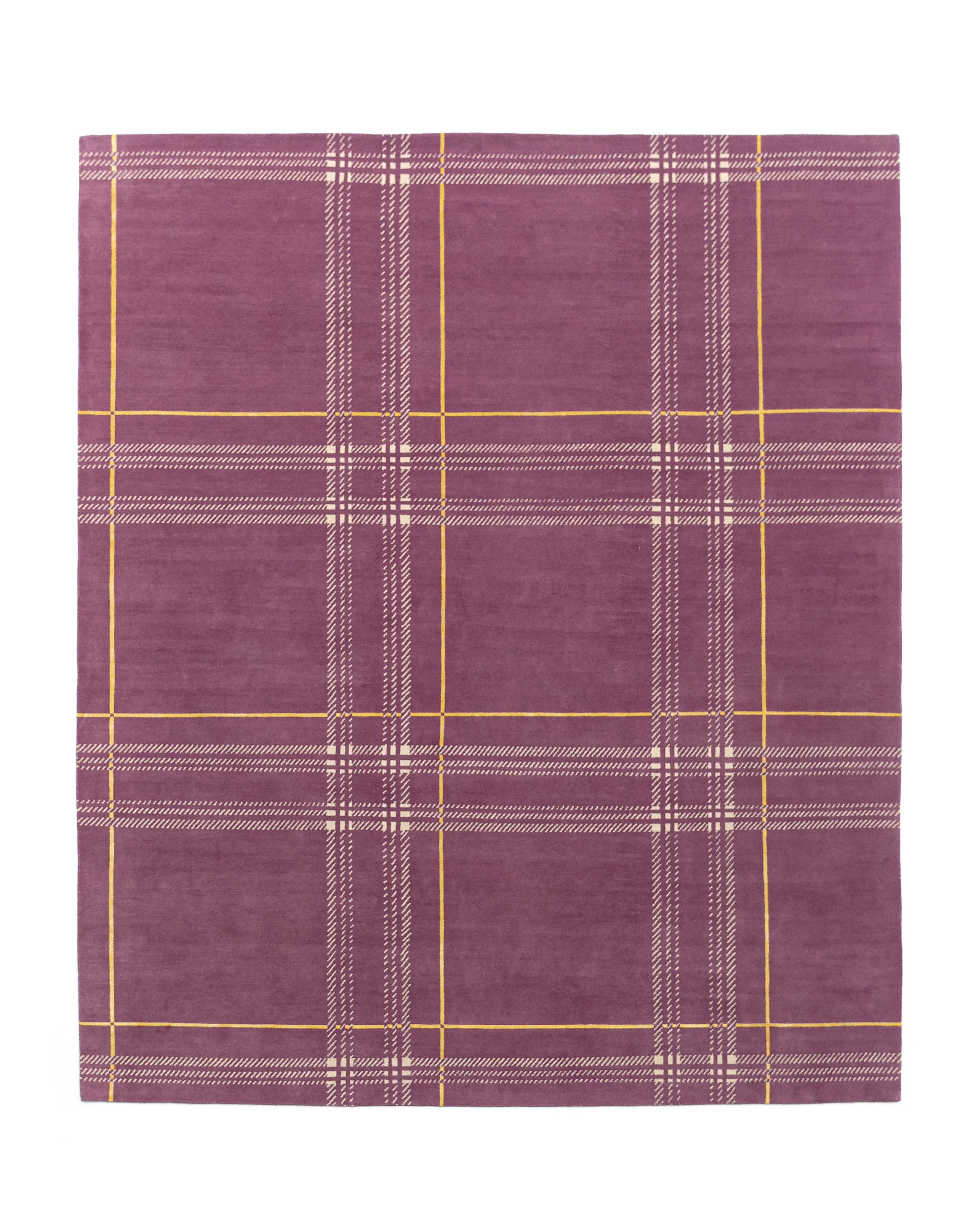 Léon Stynen écossais rug collection – handcrafted Tibetan wool and silk rugs with refined checkered design inspired by Antwerp archives.