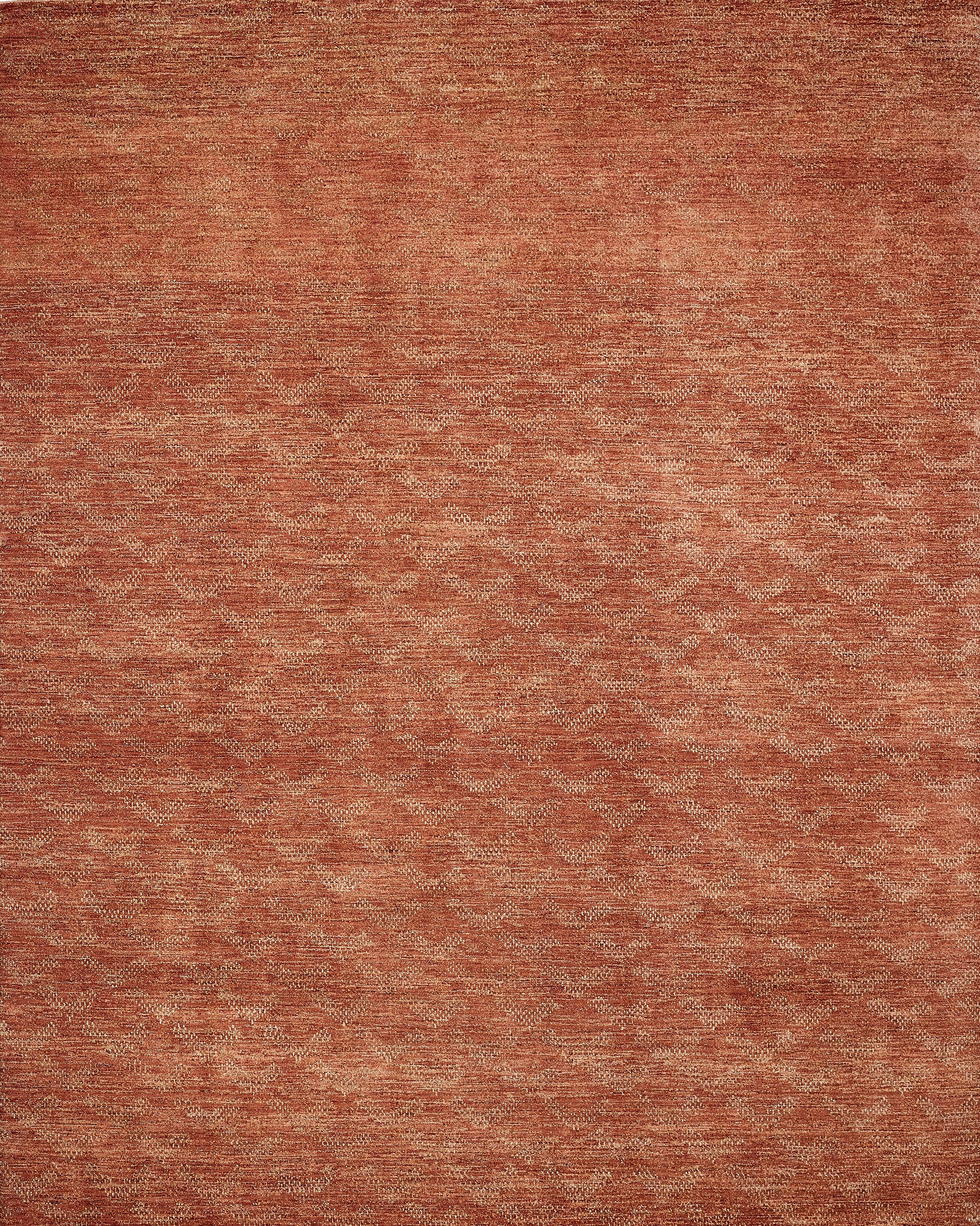 Brown textured rug on a white background
