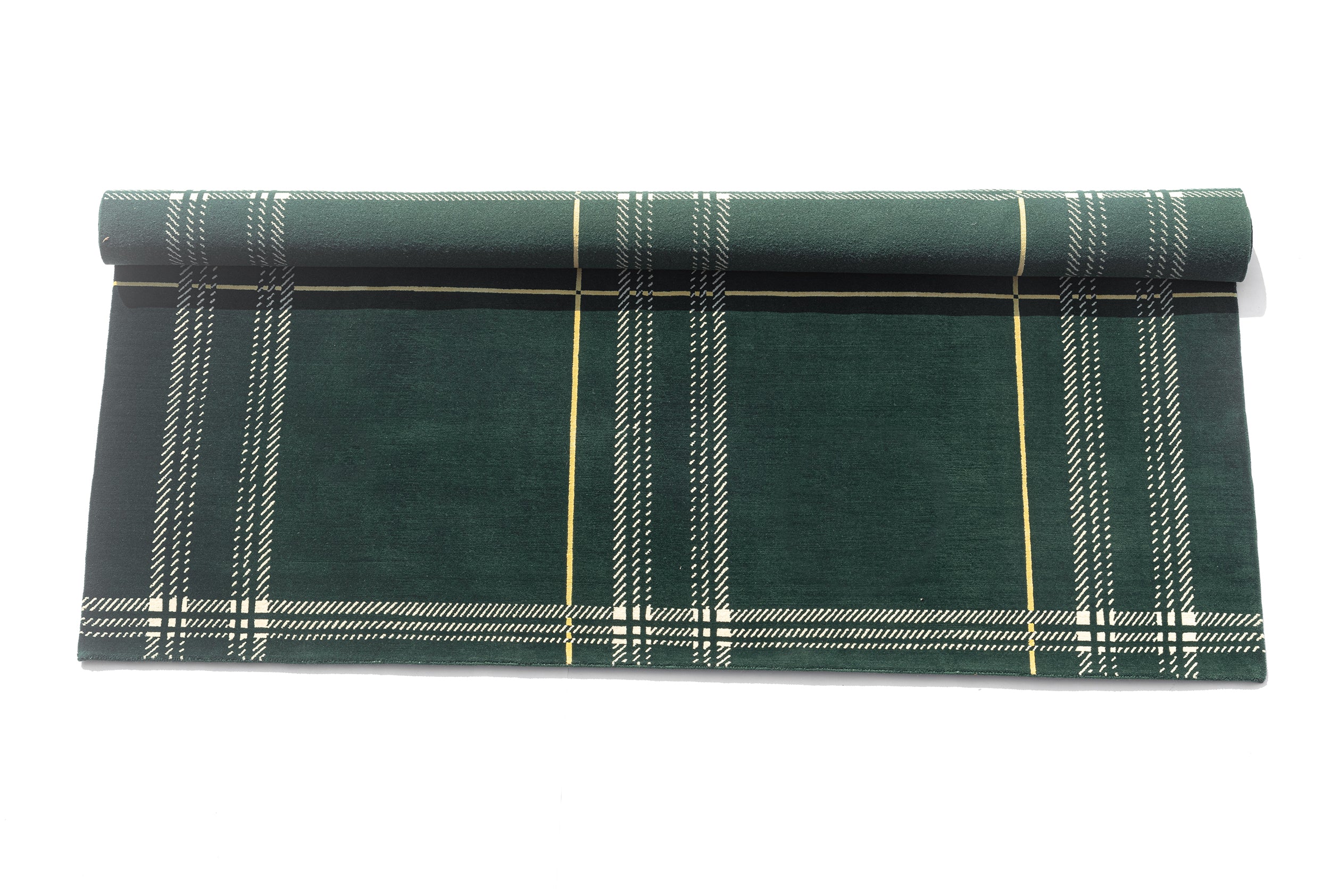 Detailed view of Léon Stynen écossais rug – intricate checkered motif with silk accents highlighting architectural grid.