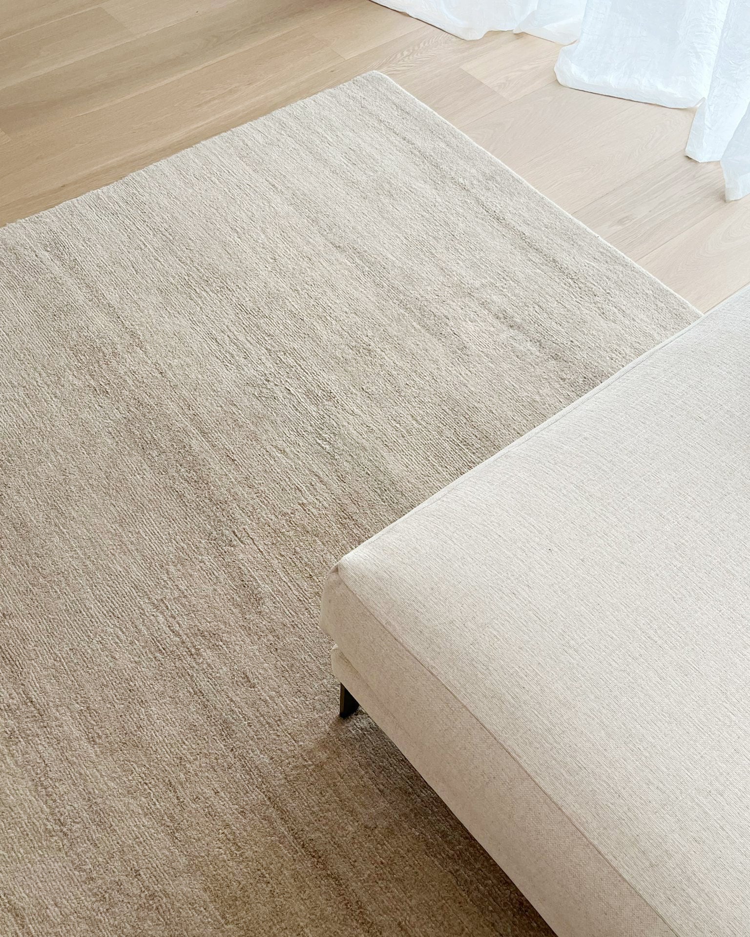 Close-up and detail of hand-knotted texture showing silk highlights and wool weave in luxury rug Knokke