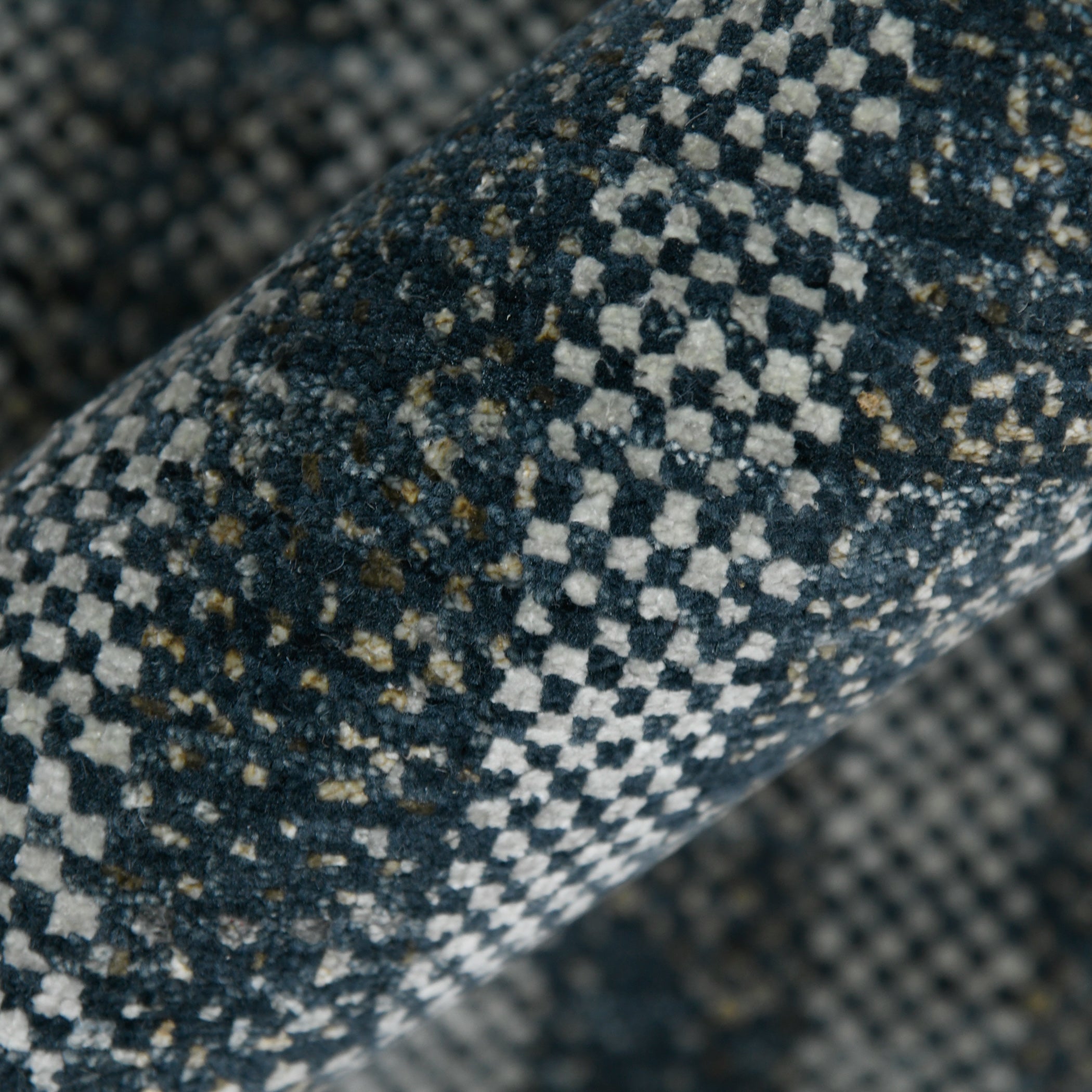 dark_charcoal_checkered_rug_from_india_folded