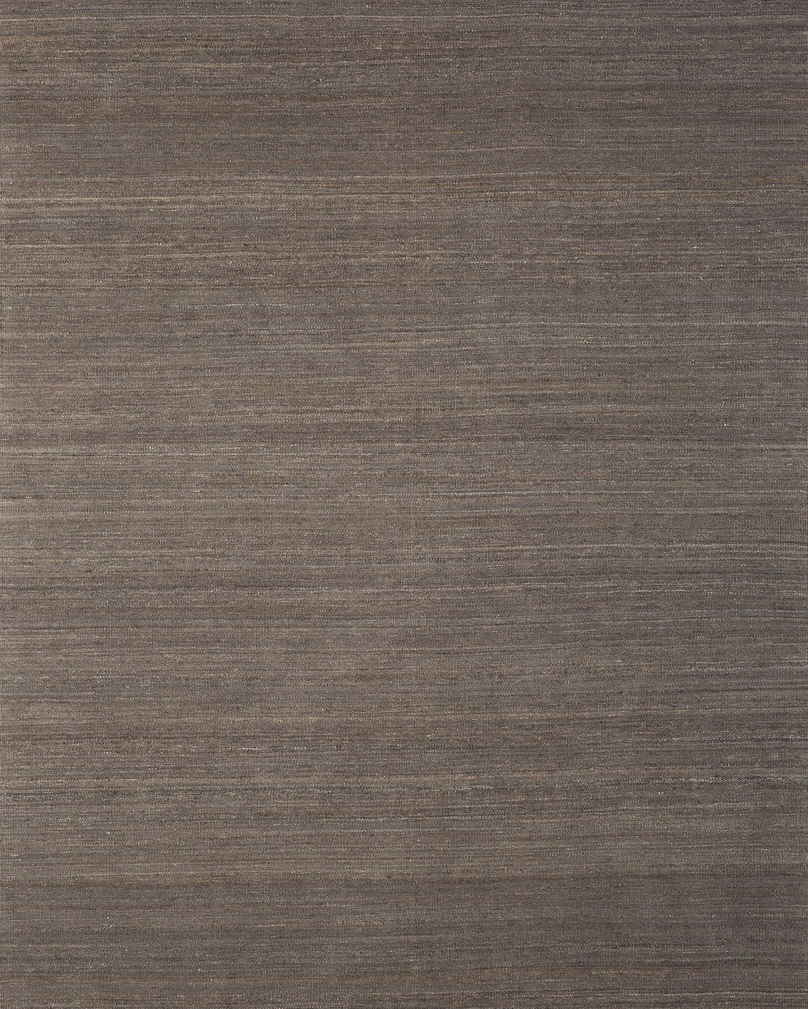 A flatweave kilim rug in a gray color with a textured surface.