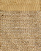 A rectangular jute rug with beige color featuring a geometric pattern.