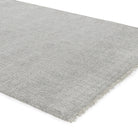 Gray textured rug on a white background