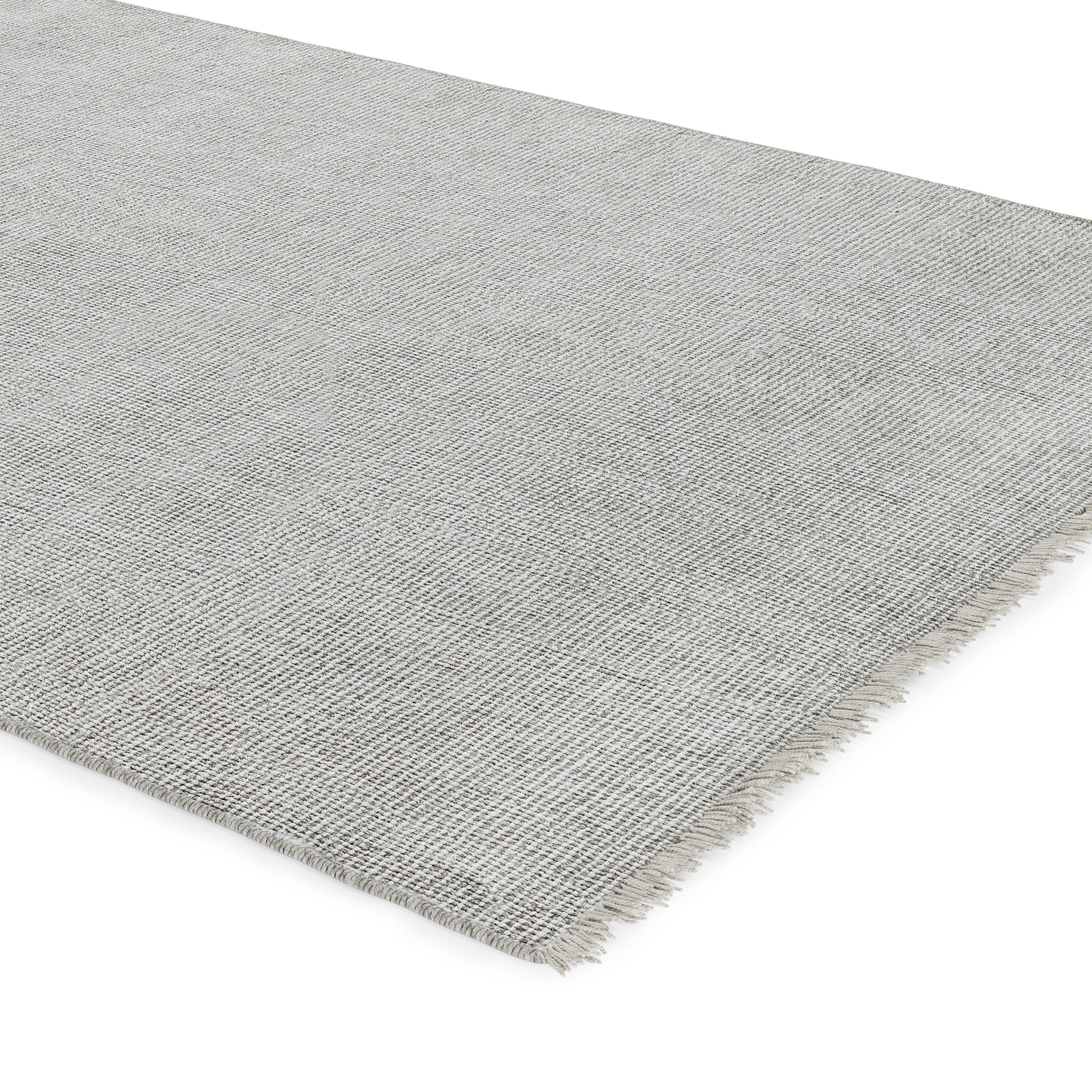 Gray textured rug on a white background