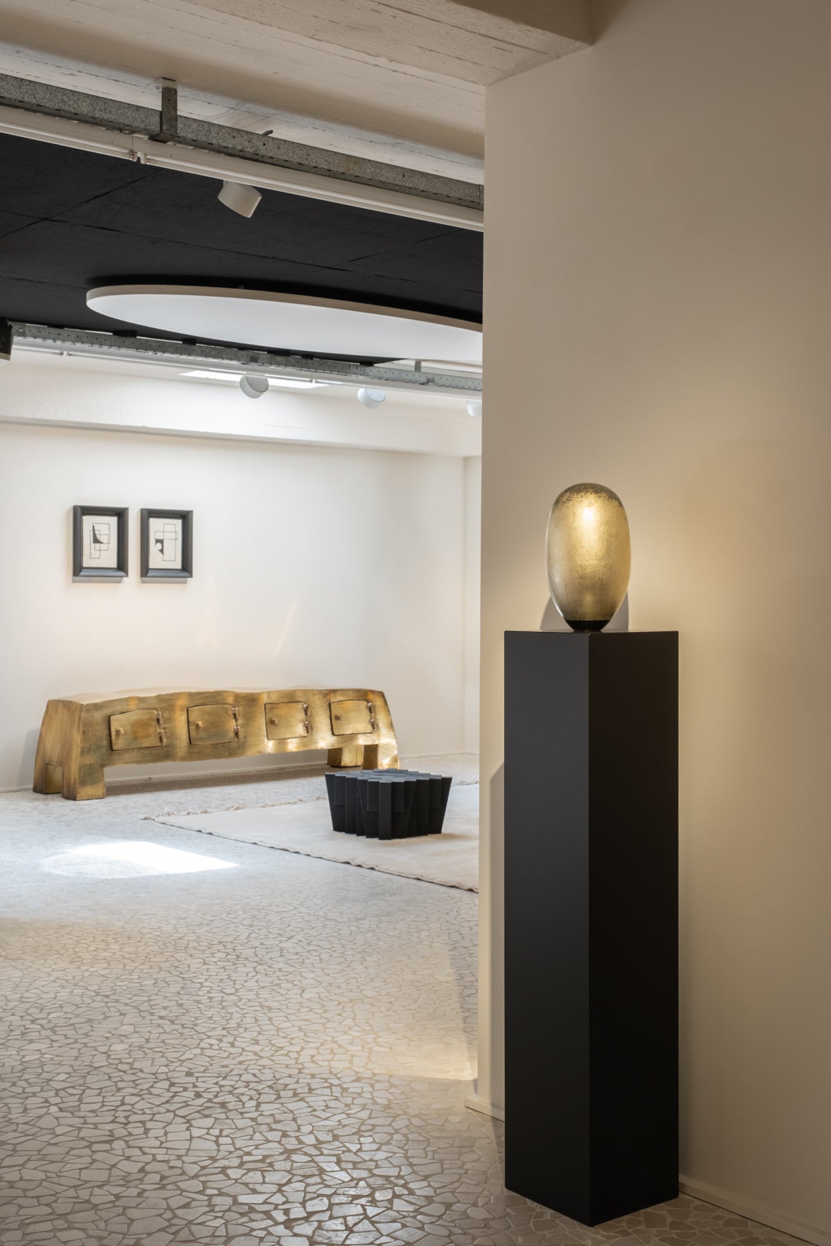 Ashtari Carpets installation at Gallery Verbaet Knokke combining handmade rugs with contemporary Belgian art