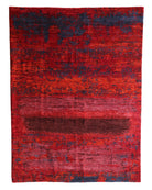 Hand-knotted Movement in Red rug by Tim Van Steenbergen, showcasing vibrant red gradients with deep, layered shadows in an abstract, painterly texture.