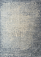 A rectangular rug with a petrol blue color that transitions into lighter shades towards the edges organic shade