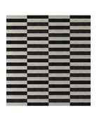 Checkered black and white rug on a white background