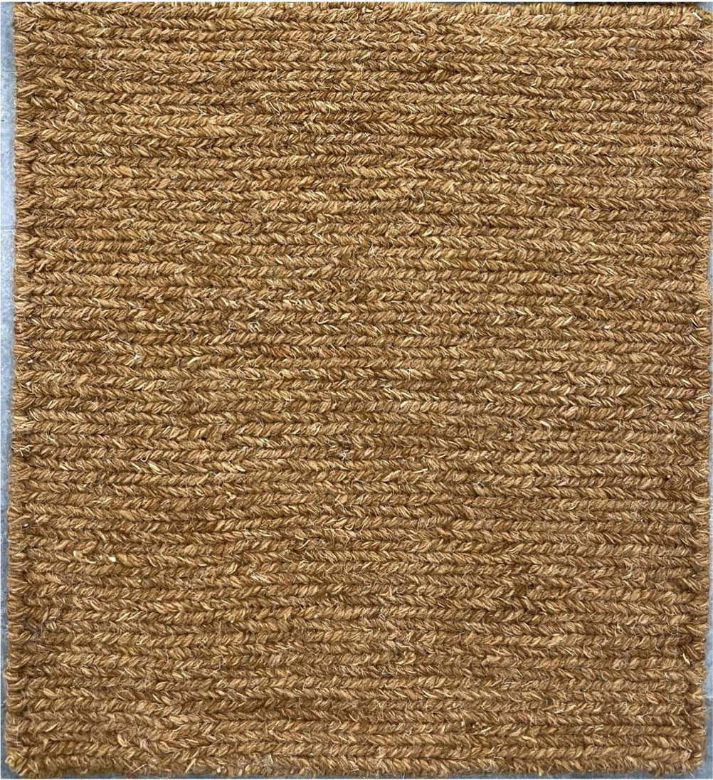 Brown textured rug with a subtle pattern