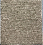 Textured brown rug with a subtle pattern