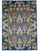 Decorative rug with floral and geometric pattern on a blue background