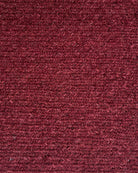 Close-up of a textured burgundy fabric surface